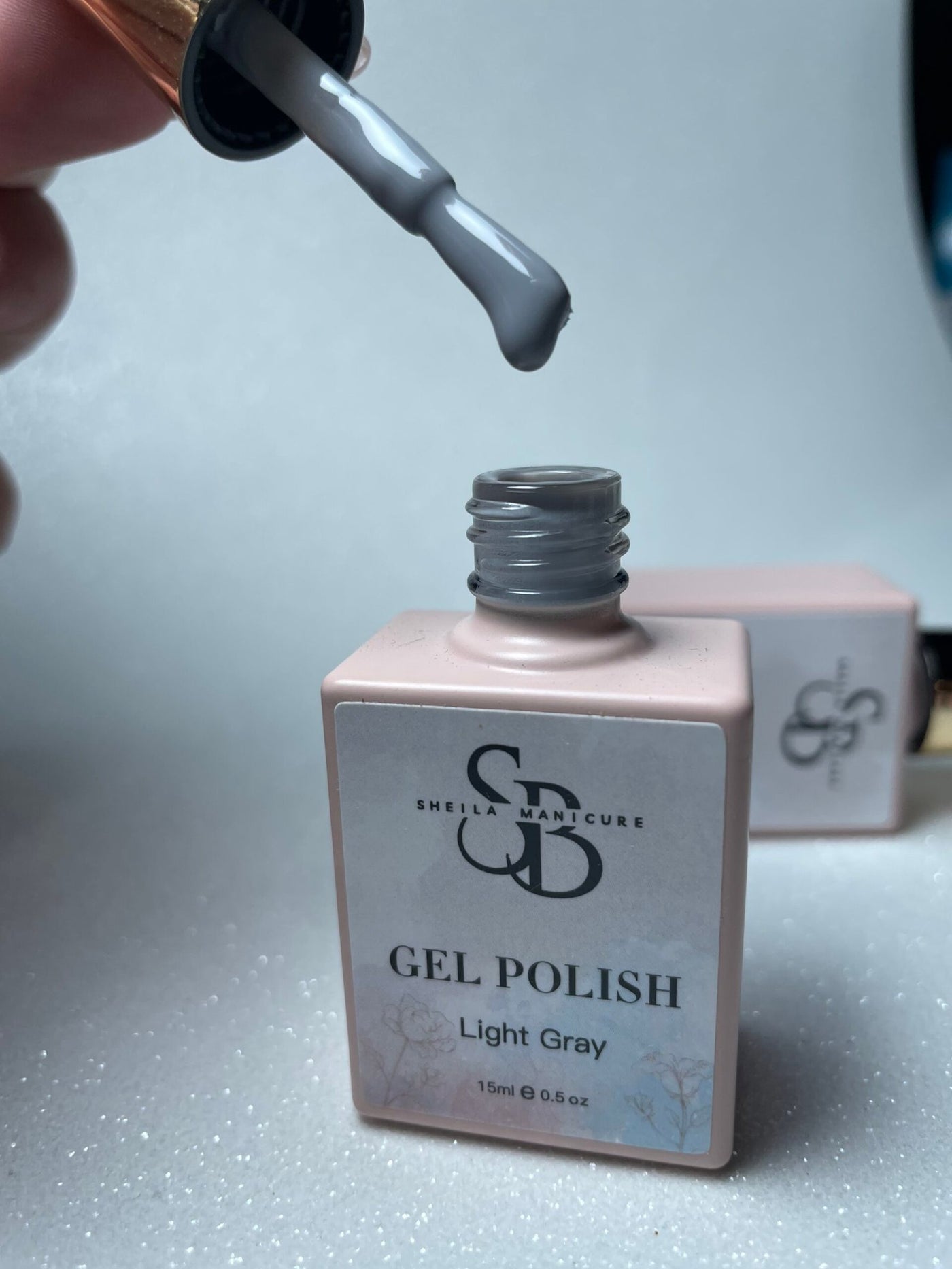 Light gray esmalte gris