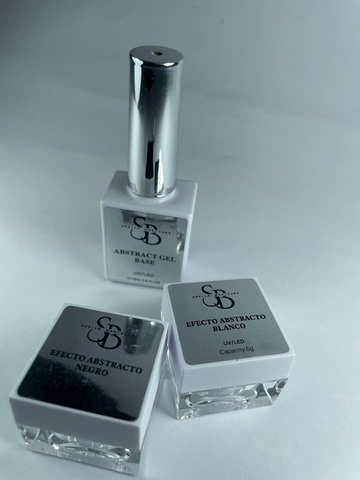 Efecto abstract base + gel blanco+ gel negro